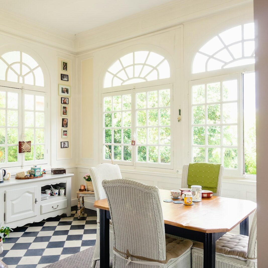 brown wooden table with chairs